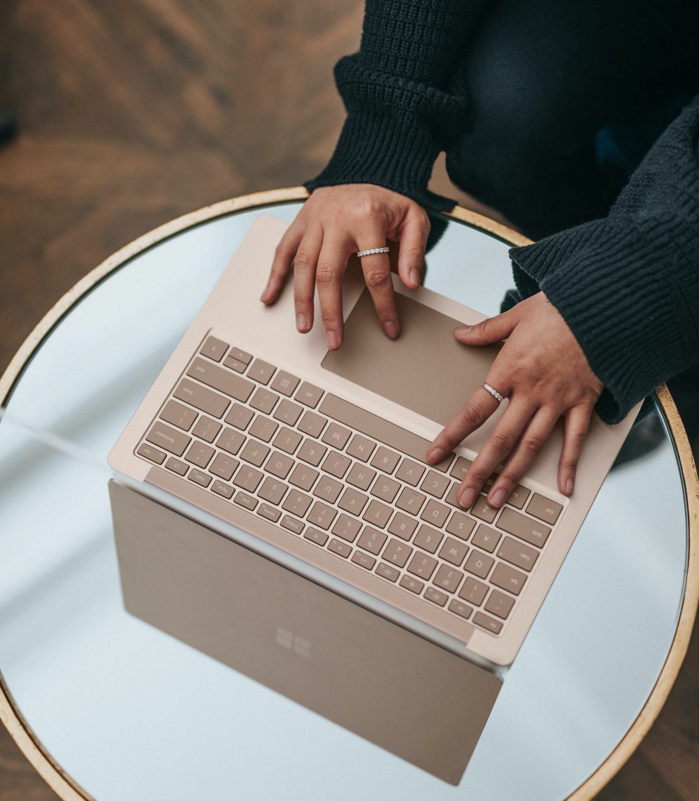 surface-linkedin-update-woman-hands-laptop-microsoft