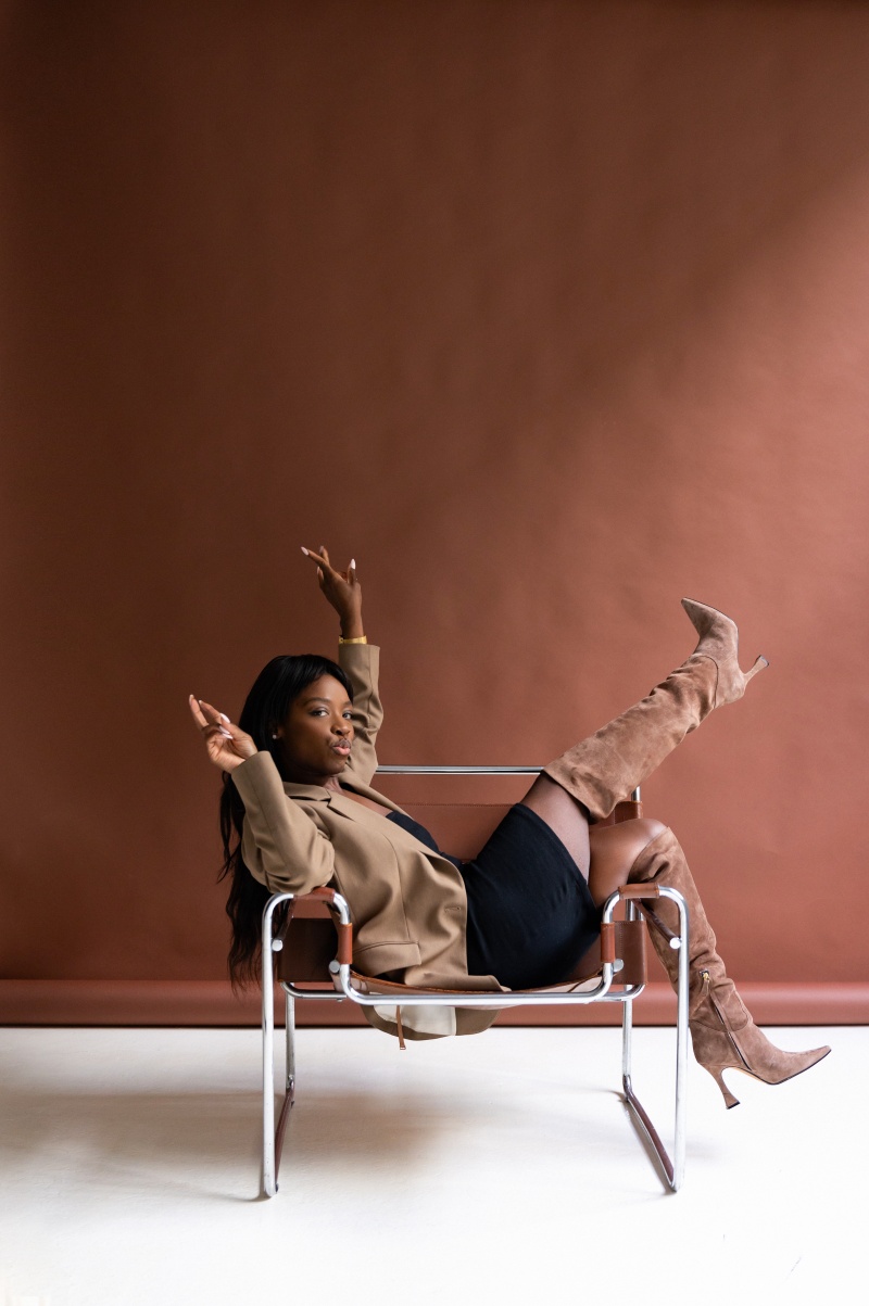 ursula black woman in tech professional peace sign 