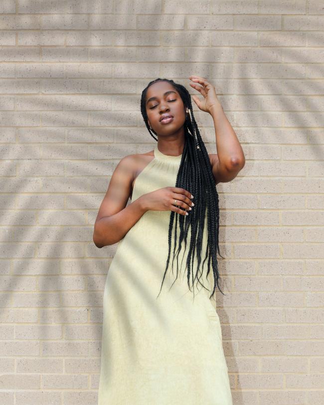 Woman Standing in front of wall dating advice tips matchmaker