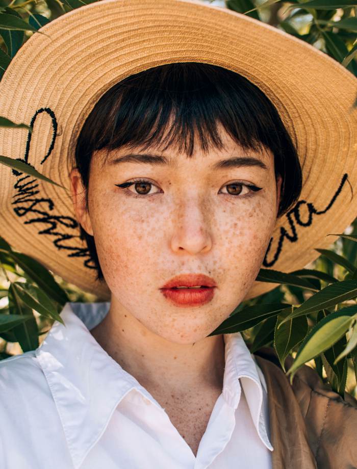 azamat-zhanisov-imposter-syndrome-test-woman-in-hat-portrait