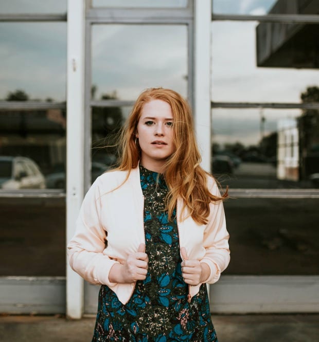 dc-holiday-parties-woman-standing-front-camera-washington-capitol-standard