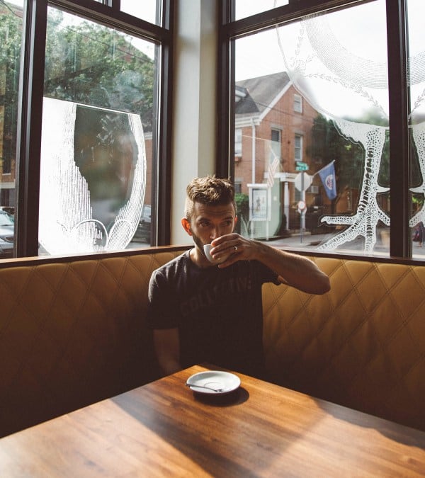 manage-professional-crisis-damage-control-man-sipping-coffee-diner