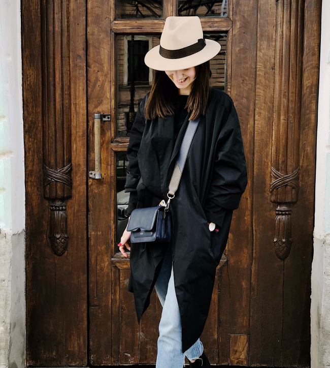 money-personal-mantra-definition-Woman-Wearing-Black-Coat-and-Faded-Blue-Jeans