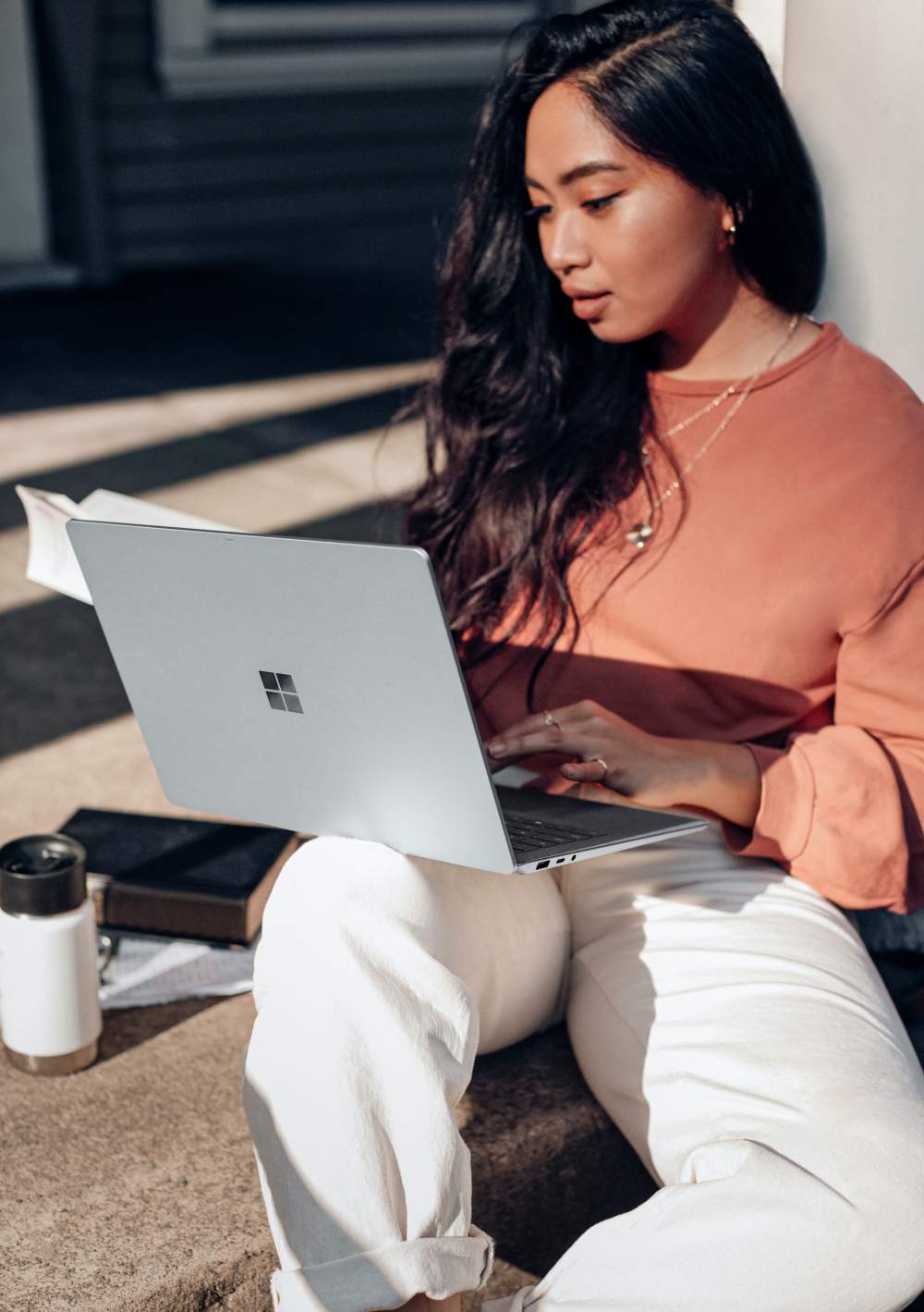work from home working outside woman asian on laptop