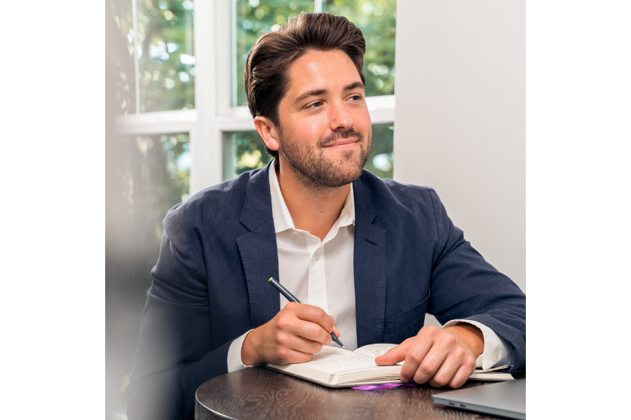 A employer taking notes in an interview